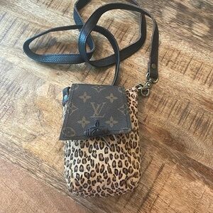 Louis Vuitton hand made cross body purse. With key chain coin purse.